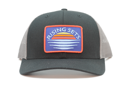 Rising into the Sets Trucker Hat